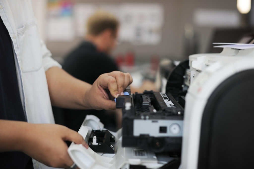 people hands opening checking printer in office 2023 11 27 05 32 21 utc